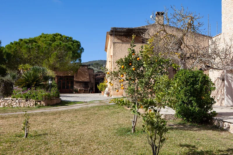 Garden and stone facade of the estate