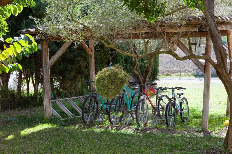Pergola with bicycles in the garden